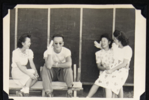 Four adults outside a barrack (ddr-densho-542-739)