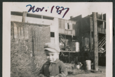 Photo of a toddler in a jacket and hat (ddr-densho-483-707)