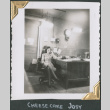 Woman sitting at a desk on the phone (ddr-densho-434-243)