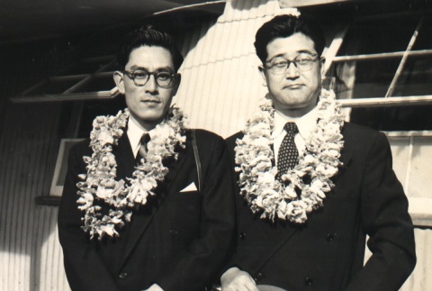 Hidemichi Kira and a man wearing leis (ddr-njpa-4-401)