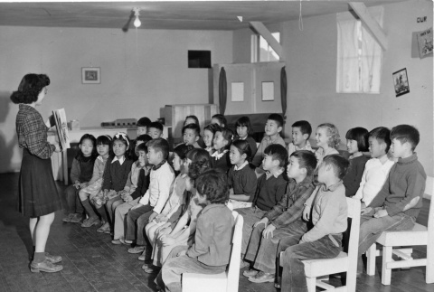 Library at Manzanar, Miss Matsuoka (librarian), Miss Ishida's class (ddr-csujad-29-194)