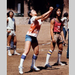 Mary Eijima and Calvin Iyoya playing volleyball (ddr-densho-336-319)