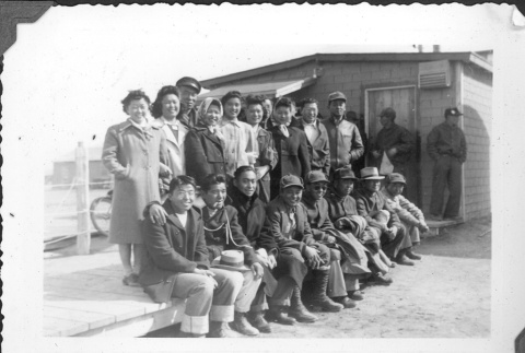 Group of Japanese Americans in camp (ddr-densho-157-57)