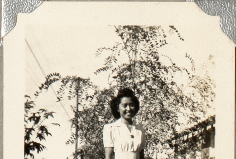Woman standing on lawn (ddr-densho-587-39)