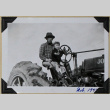 Man and child on tractor (ddr-densho-359-1632)