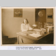 Yoriko (Shimasaki) Kitagawa sitting at desk (ddr-densho-539-11)