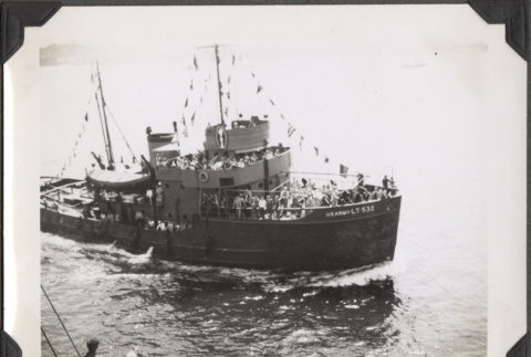 Tug boat with flags seen from ship (ddr-densho-466-165)