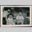 Two children at a picnic (ddr-densho-523-109)