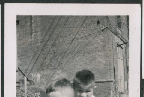 Photo of two children in a pram (ddr-densho-483-787)