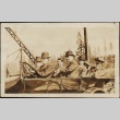 Seven men in an open touring car (ddr-densho-259-230)