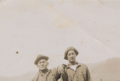Two men standing (ddr-janm-17-36)