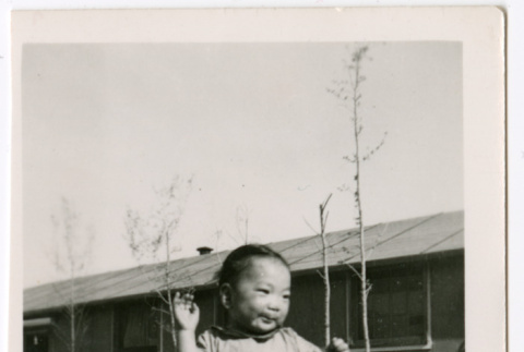 Toddler outside barracks (ddr-densho-329-1335)