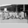 Crowd at Tokyo Station taxi stop (ddr-densho-1007-1187)