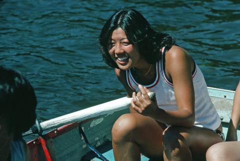 Kathy Kashima in a row boat during boat sink (ddr-densho-336-1118)