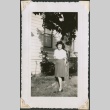 Young woman standing by tree (ddr-densho-321-149)