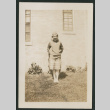 girl in front of a building (ddr-densho-378-344)