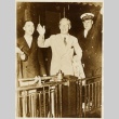 Men waving to a crowd (ddr-njpa-1-1841)