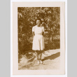 Woman posing outdoors (ddr-densho-475-39)