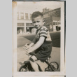 Photo of Paul Ima on a tricycle (ddr-densho-483-863)