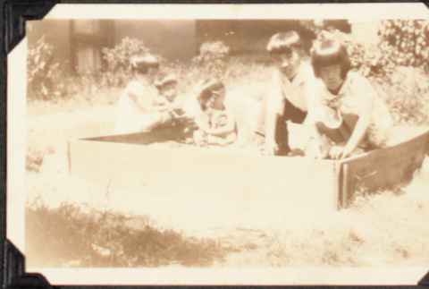 Children playing in sandbox (ddr-densho-355-895)