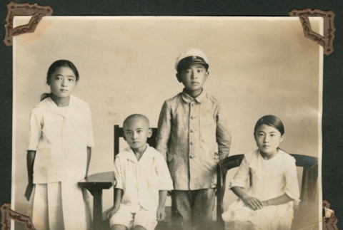 Portrait of four siblings (ddr-densho-359-22)