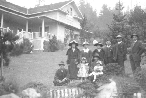 Family outside their home (ddr-densho-102-15)