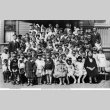Large group of children posing for photo on steps of building (ddr-ajah-3-170)