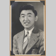 Portrait of a man in a striped jacket (ddr-densho-542-258)