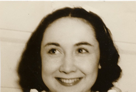 A girl wearing leis (ddr-njpa-1-780)