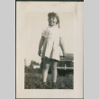 Girl standing by car (ddr-densho-316-405)
