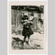 Young girl with rabbit toy (ddr-densho-475-353)