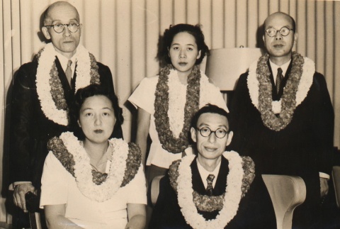 Kocho Otani, his wife, and others wearing leis (ddr-njpa-4-1896)