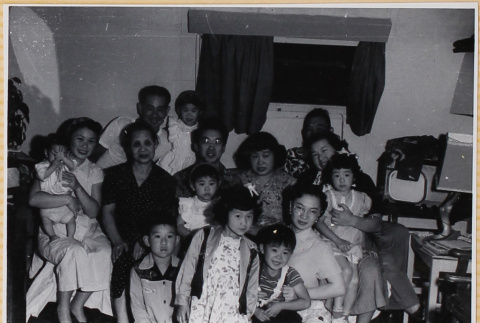 Group photo of seven adults and seven children (ddr-densho-522-341)