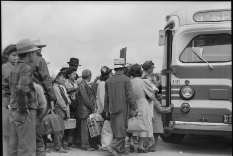 Japanese Americans boarding bus (ddr-densho-151-206)