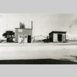 Gas station in front of fire station (ddr-densho-204-3)