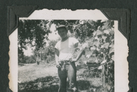 Man stands outside (ddr-densho-471-198)