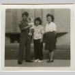Japanese American soldier with two women and baby (ddr-densho-201-178)