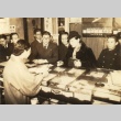 Takiko Mizunoe and others buying International Exposition tickets (ddr-njpa-4-738)
