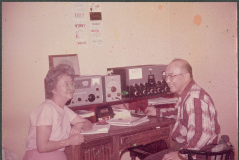 Agnes and Chester Sakura sitting by wireless set (ddr-densho-523-613)