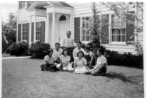 Group sitting on lawn in front of house (ddr-densho-1007-44)