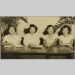 Four women sitting at a table (ddr-njpa-5-81)