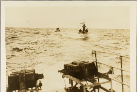 Men riding in boats (ddr-njpa-13-748)