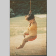 Boy on swing (ddr-densho-523-549)