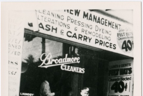 Tom Tadashi Nakayama in front of Broadmore cleaners (ddr-densho-353-243)