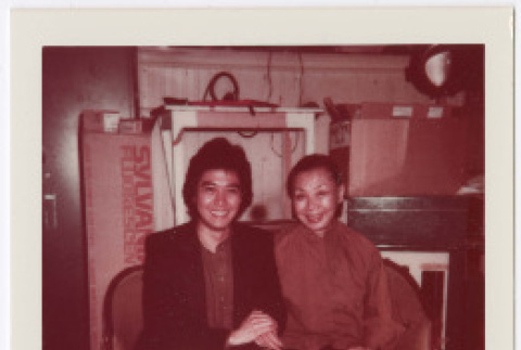 Polaroid photo of Mary Mon Toy with cast member (ddr-densho-367-350)
