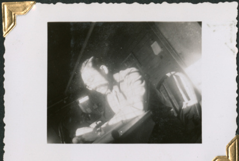 Man working at desk (ddr-densho-434-204)