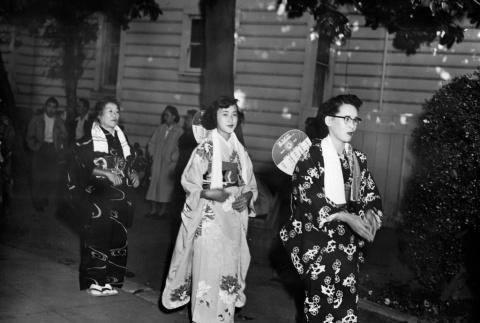 Three women performing at Obon festival (ddr-ajah-3-293)