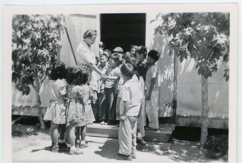 Teacher saying goodbye to her students (ddr-densho-37-2121)