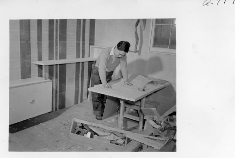 George Nakashima constructing a model apartment (ddr-fom-1-881)