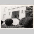 Tomoye Takahashi in front of house (ddr-densho-426-93)